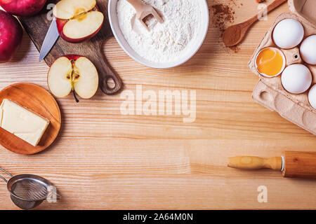 Ingredients for making apple pie on wooden table Stock Photo