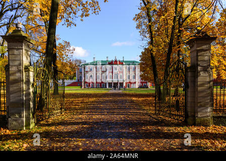 View to Kadriorg palace from park with yellow leaves on trees at autumn. Sunny clear sky, warm fall Stock Photo