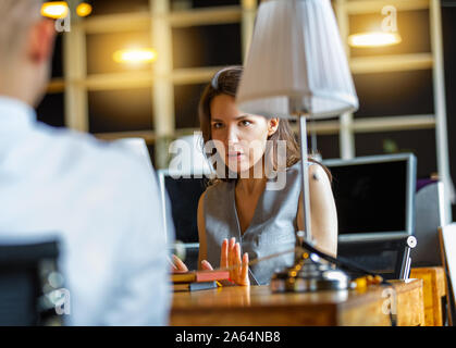 conflict women at work with his colleague Stock Photo