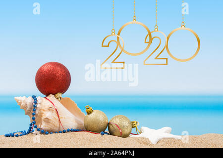 new year 2020. Christmas tree decorations on the beach in tropical. Concept of new year holiday in hot countries Stock Photo