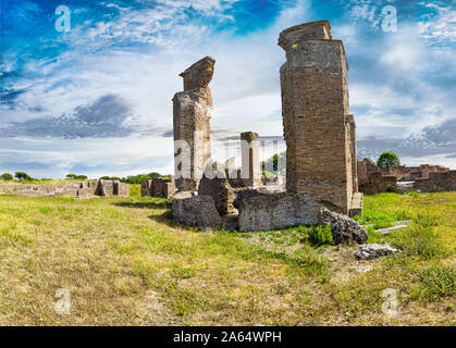 Archaeological excavations of Ostia Antica and beautiful scenery panoramic landscape with the ruins of Marine Door thermal baths and its gym, in Itali