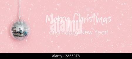 disco ball bauble on pink background. party concept Stock Photo