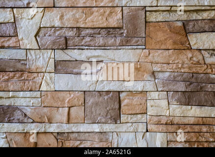 A fragment of wall covered with ceramic tiles Stock Photo