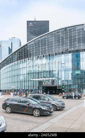 outside view of CNIT, centre des nouvelles industries et technologies, with areva tower in background, Stock Photo
