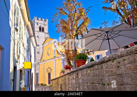 Motovun. Old cobbled street and church in historic town of Motovun, Istria region of Croatia Stock Photo