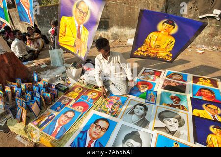 Hawker selling posters on pavement, Dadar, Mumbai, Maharashtra, India, Asia Stock Photo