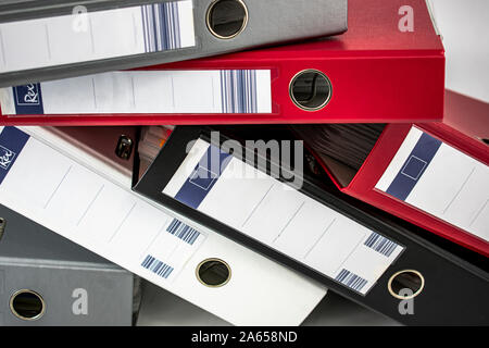 Office document filing cabinets of different colors on white background Stock Photo