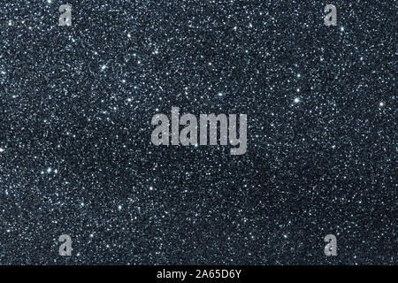 Dark blue glitter texture holidays background. Macro shot Stock Photo