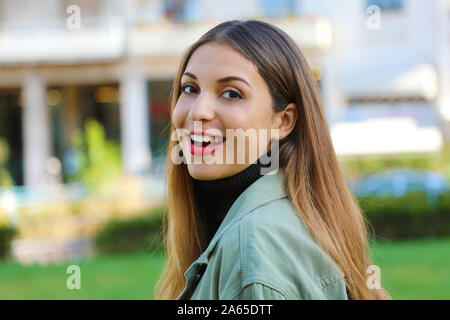 Close up of young woman with polo neck and jacket in Autumn outdoors. Stock Photo