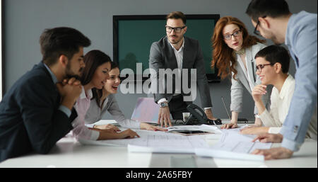 Group of architects working on project Stock Photo
