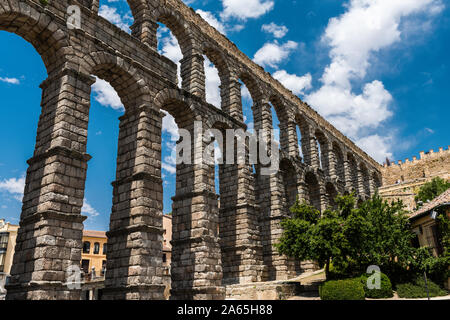 The Roman aqueduct in Segovia near Madrid in Spain Stock Photo