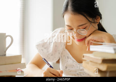 A pretty girl in reading room Stock Photo