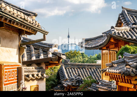 Bukchon Hanok village in Seoul with view on traditional houses roofs and tower in the distance in Seoul South Korea Stock Photo
