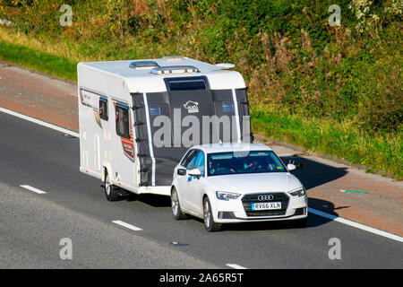 2016 white Audi A3 Sport TDI towing caravan UK Vehicular traffic