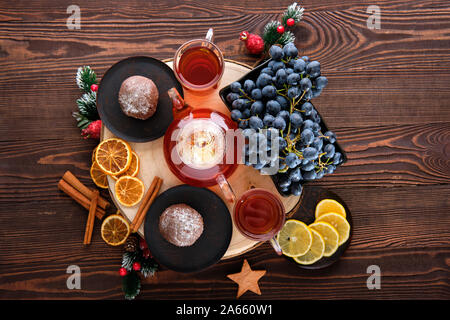 Top view of grape and lemon tea with chocolate cake Stock Photo