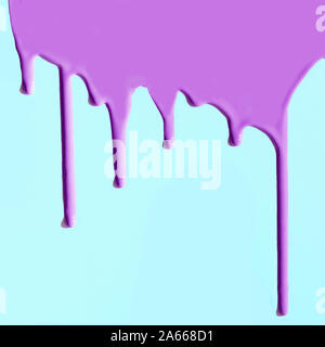 Pouring purple paint and drops on neo mint or blue background. Creative repair pattern with copy space. Stock Photo