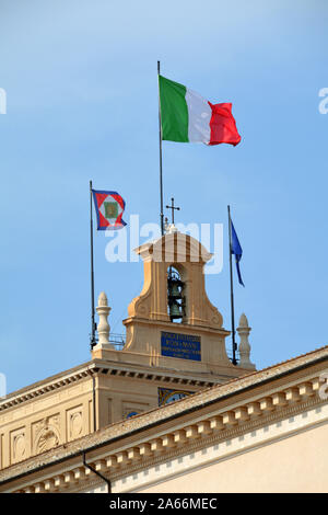 Flags on the Quirinal Palace at the Piazza del Quirinale in Rome. Residence of the President of the Italian Republic - Italy. Stock Photo