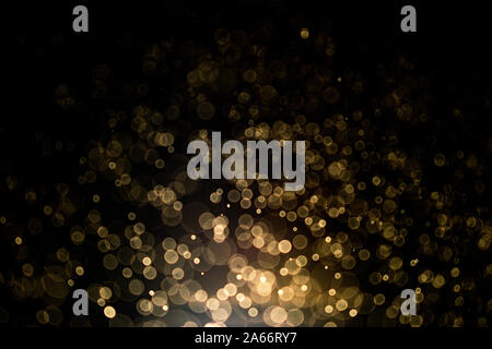 Texture background abstract black and gold Glitter and elegant for Christmas Dust white. Sparkling magical dust particles Magic concept Abstract backg Stock Photo