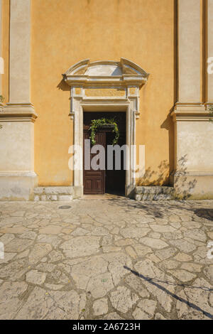 Old Wood Door, Entrance of an Ancient Church, Eze-Ville, Nice, France Stock Photo