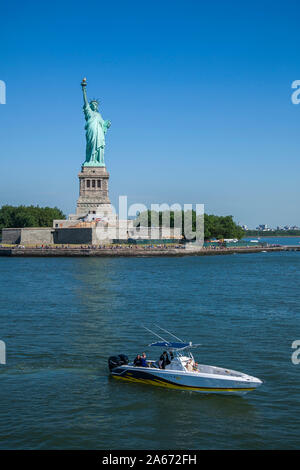 New York, USA, July 2012 -  Boating on Hudson river near the Statue of Liberty Stock Photo