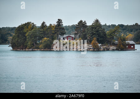 Autumn landscape in the 1000 islands. Houses, boats and islands. Lake Ontario, Canada USA Stock Photo