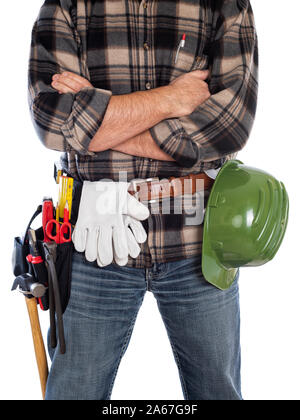 Adult craftsman carpenter isolated on white background with arms crossed. Work tools industry construction and do it yourself housework. Stock photogr Stock Photo