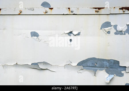 Texture of painted metal plate. Gray sheet of metal. Old shabby white background and rust. Stock Photo