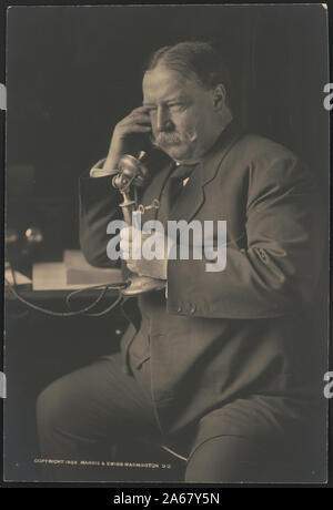 William Howard Taft, three-quarter-length portrait, seated, facing left, talking on a telephone as he receives news about his nomination as the 1908 Republican presidential candidate from President Theodore Roosevelt] / Harris & Ewing, Washington, DC Stock Photo