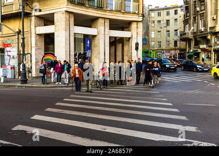 Pedestrians crossing in street in the morning, Bucharest, Romania, 2019 Stock Photo