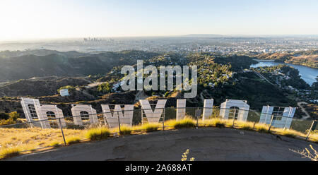 Los Angeles, California, USA - October 21, 2019:  Early morning panorama cityscape view from the back of the Hollywood Sign in popular Griffith Park. Stock Photo