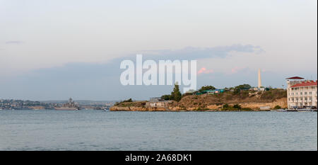 Scenic panoramic view of Aleksandrovsky Cape between  Martyn and Alexander bays from Southern breakwater in Sevastopol, Crimea, Russia. Stock Photo