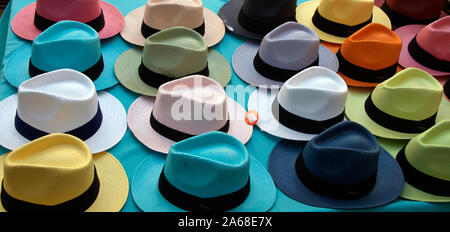Colourful mens hats on display Saturday market Fayence Var Provence France Stock Photo