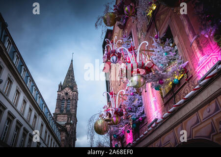 Strasbourg, France - December 28, 2017: Typical architecture house decorated for Christmas one evening in winter Stock Photo