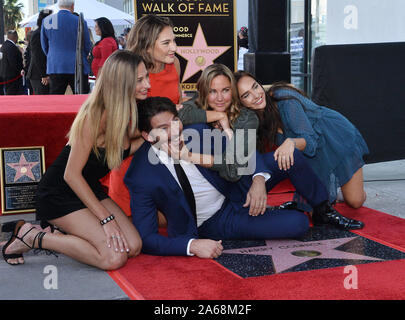 Los Angeles, United States. 24th Oct, 2019. Grammy and Emmy-award winning American singer, composer, actor, and television host Harry Connick Jr. is joined by his wife Jill Goodacre (3rd-L) and their daughters Georgia Tatum Connick, Charlotte Connick and Sarah Kate Connick (L-R) during an unveiling ceremony honoring him with the 2,678th star on the Hollywood Walk of Fame in Los Angeles on Thursday, October 24th, 2019. Connick's star is next to Cole Porter, one of his favorite songwriters. Photo by Jim Ruymen/UPI Credit: UPI/Alamy Live News Stock Photo