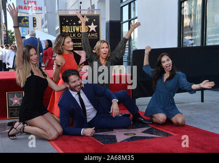 Los Angeles, United States. 24th Oct, 2019. Grammy and Emmy-award winning American singer, composer, actor, and television host Harry Connick Jr. is joined by his wife Jill Goodacre (3rd-L) and their daughters Georgia Tatum Connick, Charlotte Connick and Sarah Kate Connick (L-R) during an unveiling ceremony honoring him with the 2,678th star on the Hollywood Walk of Fame in Los Angeles on Thursday, October 24th, 2019. Connick's star is next to Cole Porter, one of his favorite songwriters. Photo by Jim Ruymen/UPI Credit: UPI/Alamy Live News Stock Photo