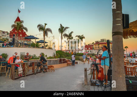 San Diego, California/USA - August 13, 2019 Historic resort on Coronado island Victorian hotel del Coronado and beach promenade at sunset. Stock Photo