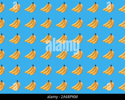 Digital seamless pattern with bananas  on light blue background. Repeating elements Stock Photo