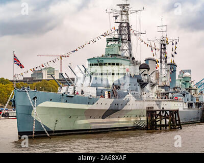 HMS Belfast, a Town-class light cruiser built for the Royal Navy. Now operated by the Imperial War Museum and permanently moored on the River Thames, Stock Photo