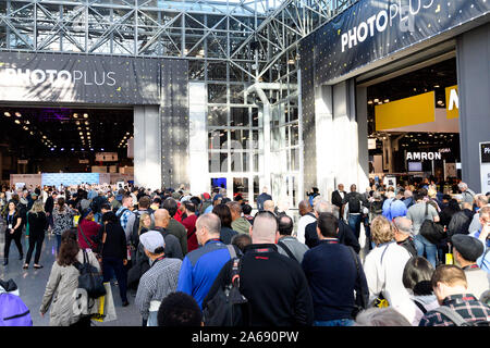 Customers line up to get into the PhotoPlus Expo conference held at the Jacob K. Javits Convention Center in New York. Stock Photo
