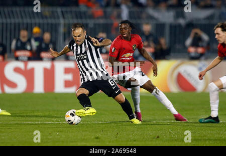Belgrade. 24th Oct, 2019. Partizan's Bibras Natcho (L) competes during a UEFA Europa League Group L football match between Partizan and Manchester United in Belgrade, Serbia on Oct. 24, 2019. Credit: Predrag Milosavljevic/Xinhua/Alamy Live News Stock Photo
