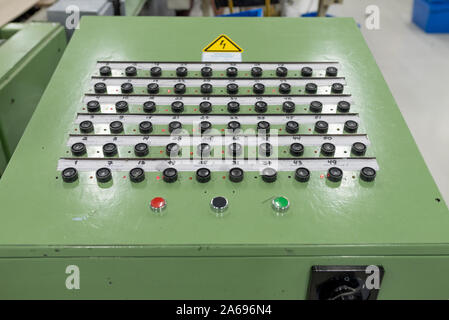 Console of the old, button conveyor Shoe production. Stock Photo