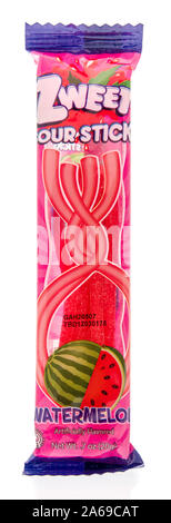 Winneconne, WI - 10 October 2019: A package of Zweet sour sticks  candy on an isolated background Stock Photo
