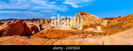 Panorama view of the colorful red, yellow and white banded rock formations along the Fire Wave Trail in the Valley of Fire State Park in Nevada, USA Stock Photo