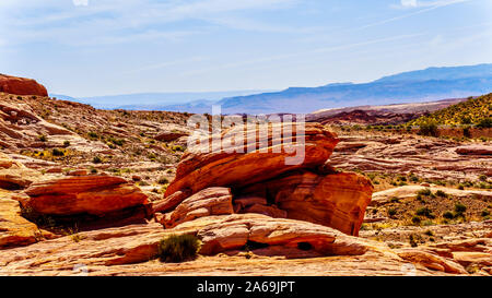 The colorful red, yellow and white banded rock formations along the Fire Wave Trail in the Valley of Fire State Park in Nevada, USA Stock Photo