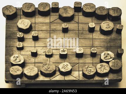 Janggi, sometimes called Korean chess, is a strategy board game popular in Korea. The game is derived from xiangqi (Chinese chess) Stock Photo