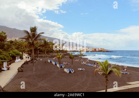 Playa Jardin  Puerto de la Cruz, in the north of Tenerife, Canary Islands, Spain.  Jardin beach with black sands is one of the most famous beaches in Stock Photo