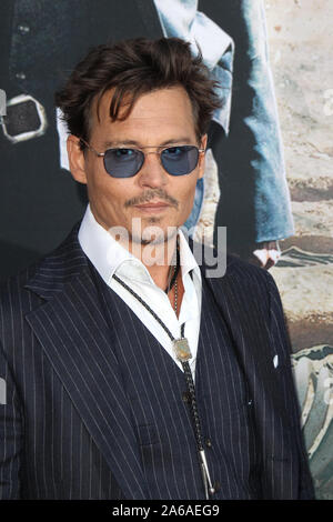 ANAHEIM, CA - JUNE 22:  Johnny Depparrives at the Los Angeles premiere 'The Lone Ranger' at Disney California Adventure Park on June 22, 2013 in Anaheim, California   People:  Johnny Depp Stock Photo