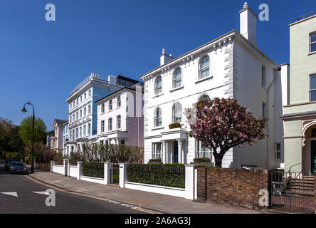 Row of houses along Regent's Park Rd, Primrose Hill, Camden, London, England, UK.