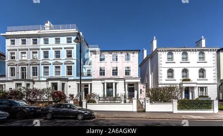 Row of houses along Regent's Park Rd, Primrose Hill, Camden, London, England, UK.
