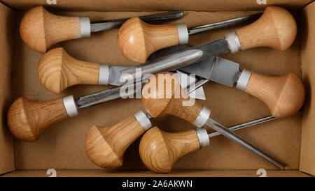 set of tools for carving in a cardboard box Stock Photo
